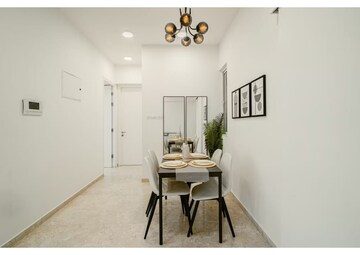 Dining area in 1 BHK Apartment at Kanakia Rainforest, Andheri East – for Sale