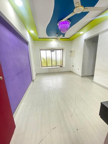 Bedroom in 1 BHK Apartment at Lokhandwala Riviera Tower, Kandivali East – for Sale