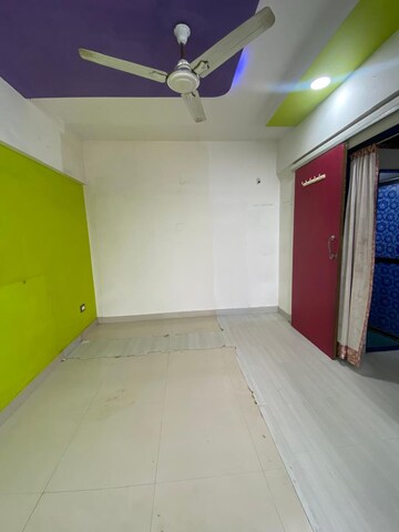 Room in 1 BHK Apartment at Lokhandwala Riviera Tower, Kandivali East – for Sale