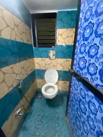 Bathroom in 1 BHK Apartment at Lokhandwala Riviera Tower, Kandivali East – for Sale