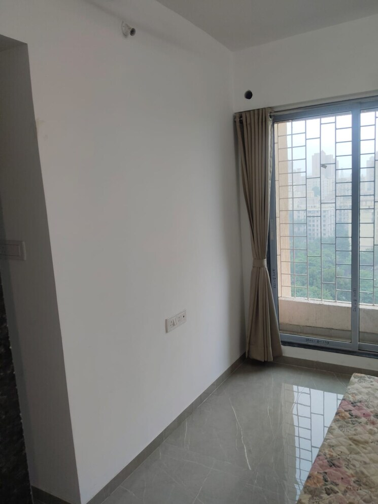 Room, cosmos-hilton 1 Bedroom 422 Sq.Ft. Apartment In Patlipada Thane 9055647