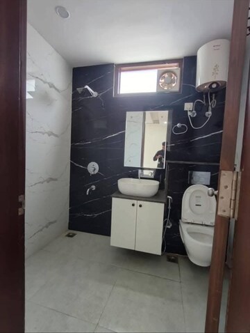 Bathroom in 3 BHK Apartment at Boutique Residential Apartments C-220, Malviya Nagar – for Rent
