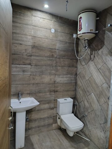 Bathroom in 3 BHK Builder Floor at Dhakoli – for Sale