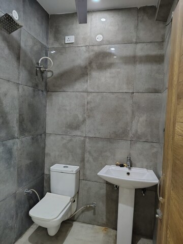 Bathroom in 3 BHK Builder Floor at Dhakoli – for Sale