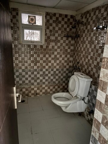 Bathroom in 2 BHK Apartment at Sikka Kaamna Greens, Sector 143a Noida – for Rent