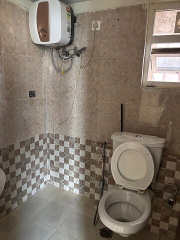 Bathroom in 2 BHK Apartment at Sikka Kaamna Greens, Sector 143a Noida – for Rent