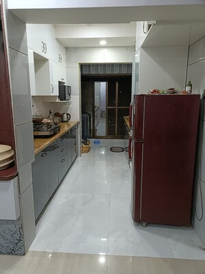 Kitchen in 3 BHK Apartment at Parshwa Girnar Tirth, Kalyan West – for Sale