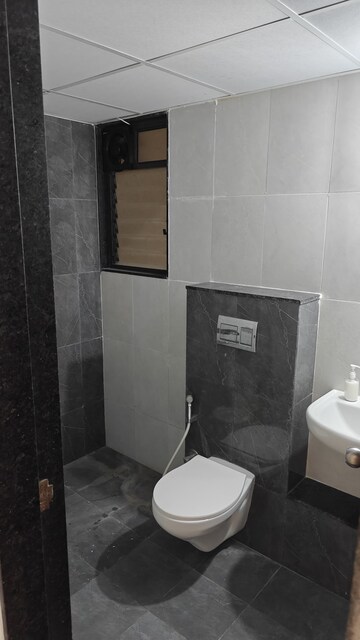 Bathroom in 2 BHK Apartment at Shapoorji Pallonji Joyville Celestia, Hadapsar – for Rent