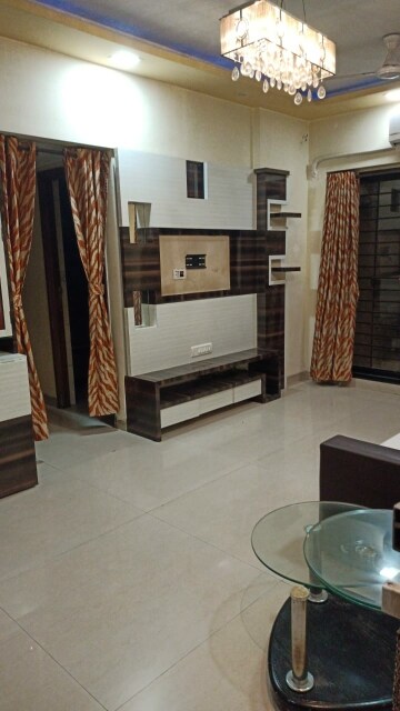 Living Room in 1 BHK Apartment at K Raheja Heights, Malad East – for Rent