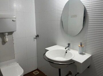 Bathroom in 2 BHK Apartment at Blue Mountains, Malad East – for Rent