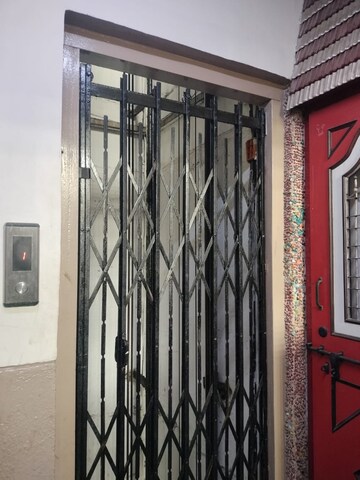 Building Lobby in 1 BHK Apartment at New Jay Palace, Yari Road – for Rent