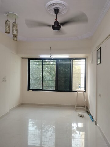 Bathroom in 1 BHK Apartment at New Jay Palace, Yari Road – for Rent