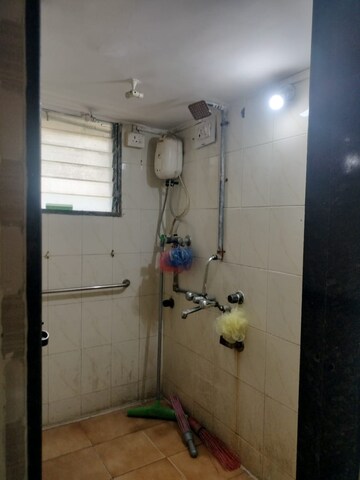 Bathroom in 1 BHK Apartment at New Jay Palace, Yari Road – for Rent