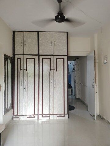 Room in 1 BHK Apartment at New Jay Palace, Yari Road – for Rent