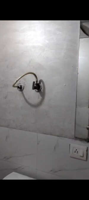 Bathroom in 2 BHK Apartment at Gaurs Cascades, Raj Nagar Extension – for Sale