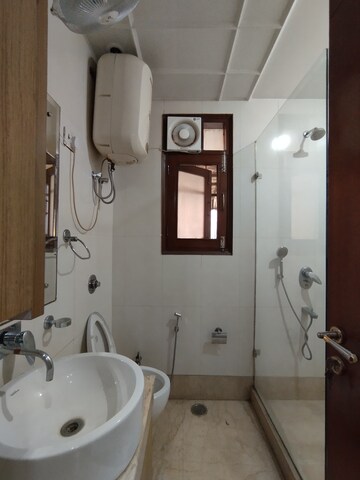 Bathroom in 4 BHK Builder Floor at DDA Flats Taimoor Enclave, New Friends Colony – for Rent