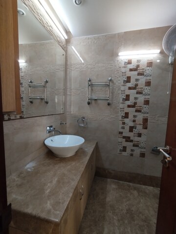 Bathroom in 4 BHK Builder Floor at DDA Flats Taimoor Enclave, New Friends Colony – for Rent