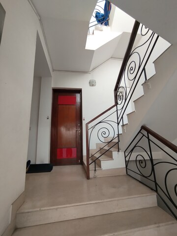 Staircase in 4 BHK Builder Floor at DDA Flats Taimoor Enclave, New Friends Colony – for Rent
