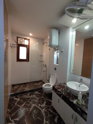 Bathroom in 4 BHK Builder Floor at DDA Flats Taimoor Enclave, New Friends Colony – for Rent