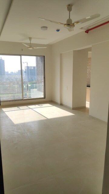 Living Room in 2 BHK Apartment at Wellwisher Kiarah Terrazo, Hadapsar – for Sale