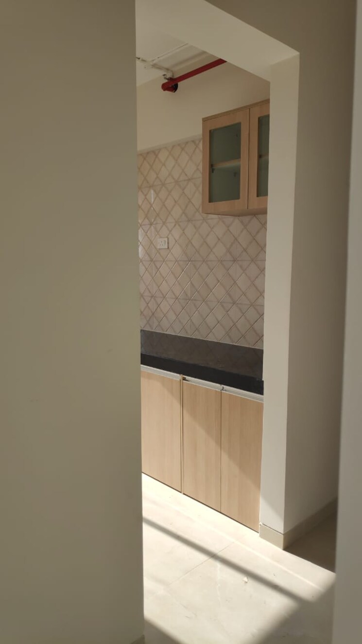 Kitchen, wellwisher-kiarah-terrazo 2 Bedroom 770 Sq.Ft. Apartment In Hadapsar Pune 9056465