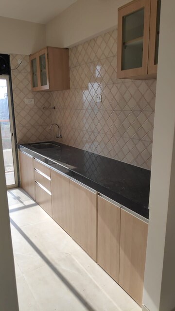 Kitchen in 2 BHK Apartment at Wellwisher Kiarah Terrazo, Hadapsar – for Sale