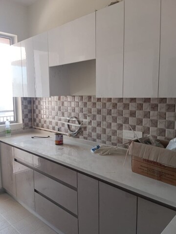Kitchen in 2 BHK Apartment at Paras Dews, Sector 106 – for Rent