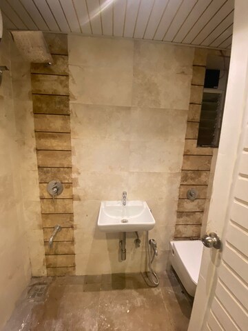 Bathroom in 2 BHK Apartment at Mohini Castle, Khar West – for Rent