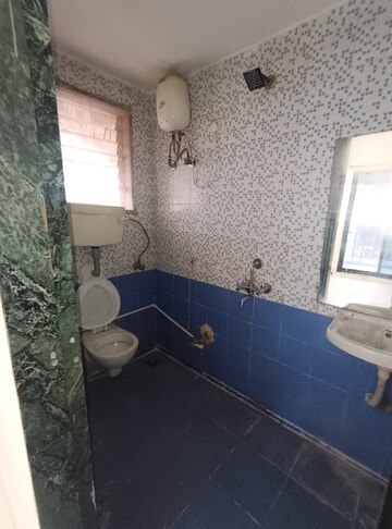 Bathroom in 2 BHK Apartment at Kopar Khairane – for Sale