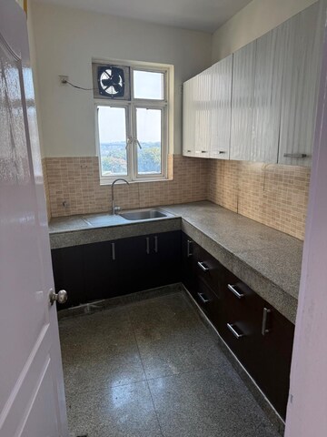 Kitchen in 2 BHK Apartment at Raheja Atharva, Sector 109 – for Rent