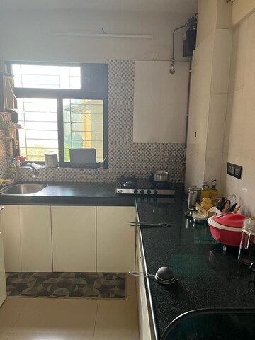 Kitchen in 2 BHK Apartment at Sudarshan Sky Garden, Ghodbunder Road – for Rent