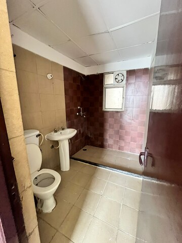 Bathroom in 2 BHK Apartment at Mahagun Mascot, Sain Vihar – for Sale