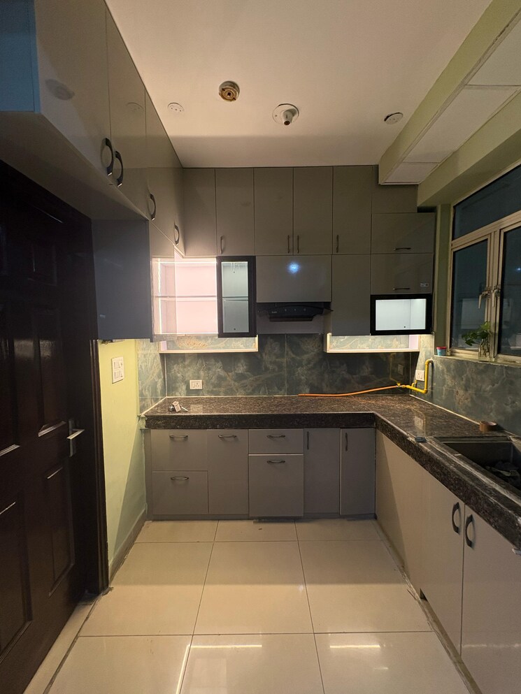 Kitchen, mahagun-mascot 2 Bedroom 1230 Sq.Ft. Apartment In Sain Vihar Ghaziabad 9056752