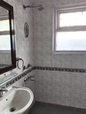Bathroom in 3 BHK Builder Floor at Nehru Enclave – for Rent