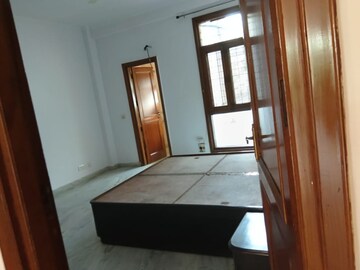 Bedroom in 3 BHK Builder Floor at Nehru Enclave – for Rent