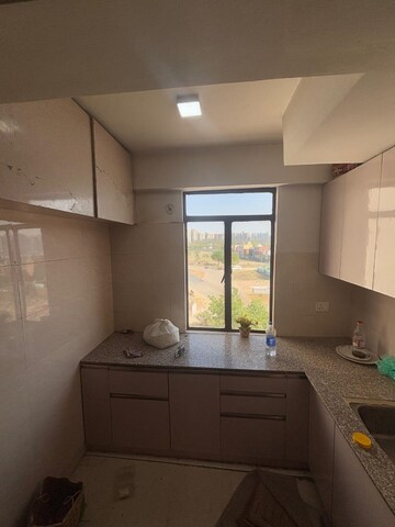 Kitchen in 2 BHK Apartment at Dreamland The Willows, Sain Vihar – for Rent