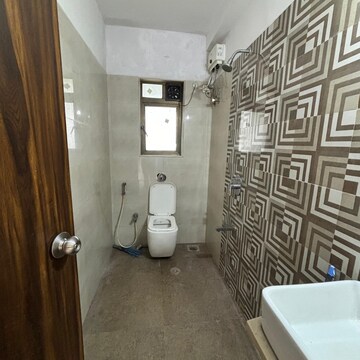 Bathroom in 2 BHK Apartment at Mallhar Bhimashankar Heights, Anand Park – for Rent