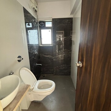 Bathroom in 2 BHK Apartment at Mallhar Bhimashankar Heights, Anand Park – for Rent