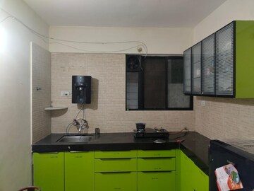 Kitchen in 2 BHK Apartment at R K Nisarg Deep, Wakad – for Rent