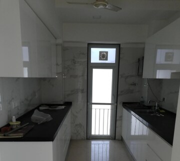 Kitchen in 3 BHK Apartment at Ruparel Ariana, Parel – for Rent