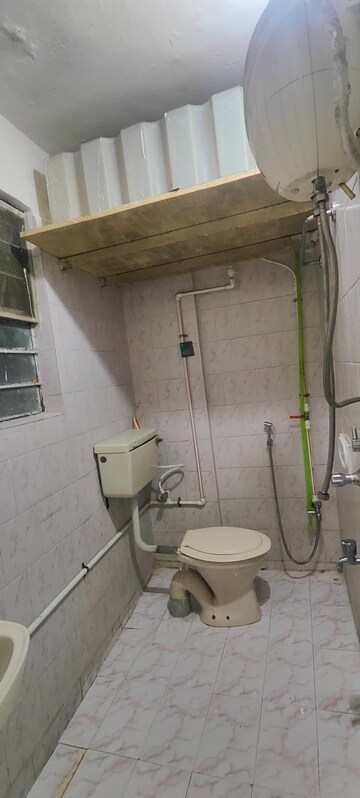 Bathroom in 2 BHK Apartment at Siddharth Nagar Phase 1, Aundh – for Rent
