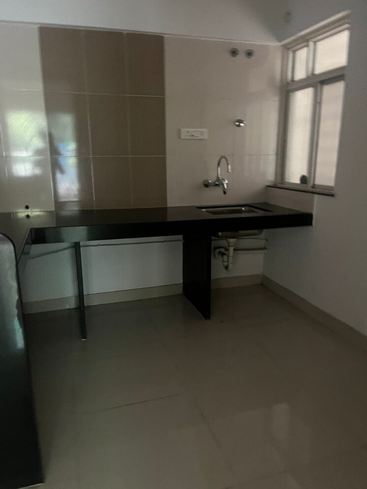 Kitchen, paranjape-schemes-yuthika 2 Bedroom 1010 Sq.Ft. Apartment In Baner Pune 9057336