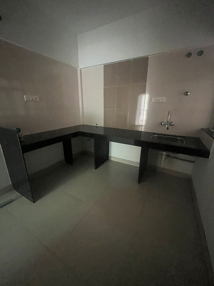 Kitchen, paranjape-schemes-yuthika 2 Bedroom 1010 Sq.Ft. Apartment In Baner Pune 9057336
