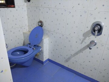 Bathroom in 3 BHK Apartment at Ajmera Golden Rays, Andheri West – for Rent