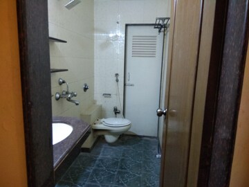 Bathroom in 3 BHK Apartment at Ajmera Golden Rays, Andheri West – for Rent