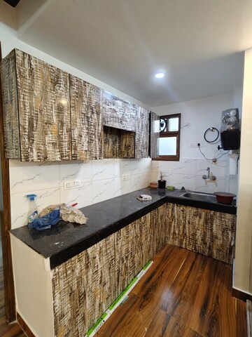 Kitchen in 2 BHK Apartment at Freedom Fighters Enclave – for Rent