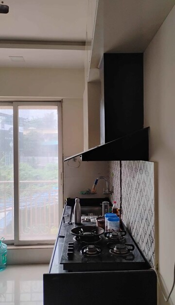 Kitchen in 1 BHK Apartment at Hiranandani Estate, Ghodbunder Road – for Rent