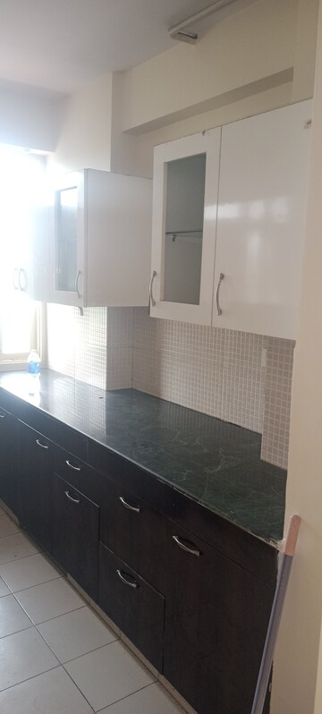 Kitchen in 2 BHK Apartment at RAS Palm Residency, Sector 76 – for Sale