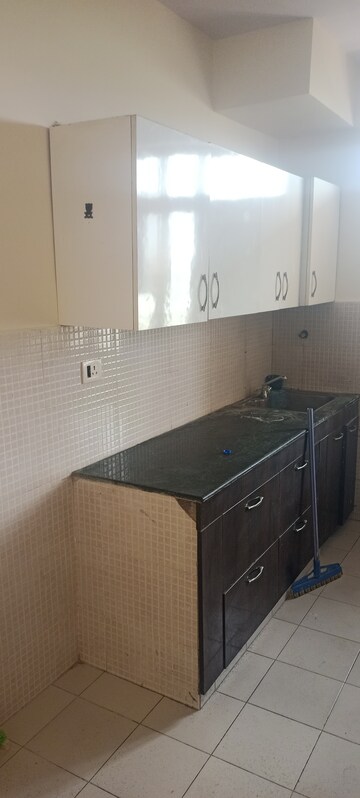 Kitchen in 2 BHK Apartment at RAS Palm Residency, Sector 76 – for Sale
