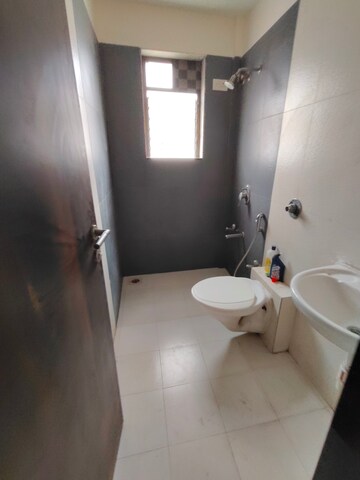 Bathroom in 1 BHK Apartment at Tycoons Daffodil, Kalyan West – for Rent